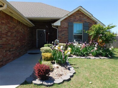 View of exterior entry featuring brick siding and 