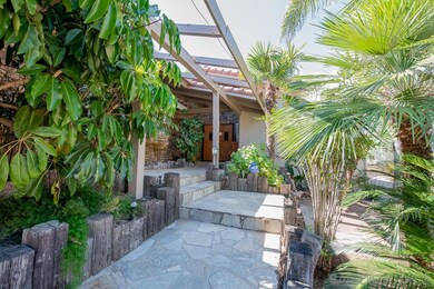 Only 3 steps up from driveway to the main living a