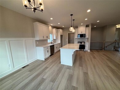 311 Mulberry Dr, Raymore, MO 64083 - photo 4