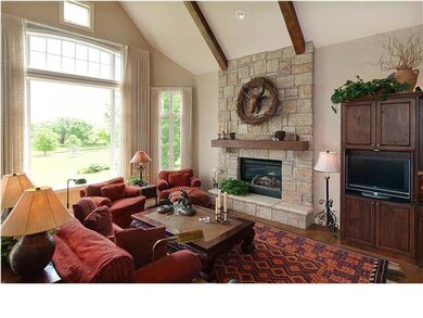 HEARTHROOM (AND VIEW OF COMMON AREA AND LAKE)
