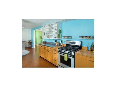 Kitchen - gas burner stove with warming drawer sho