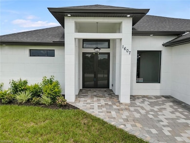 1607 NE 23rd St, Cape Coral, FL 33909 - photo 2