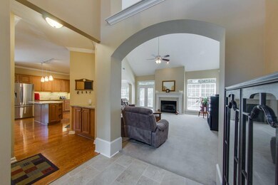 View of greatroom and kitchen from foyer.