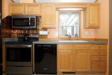 Newer kitchen appliances included.