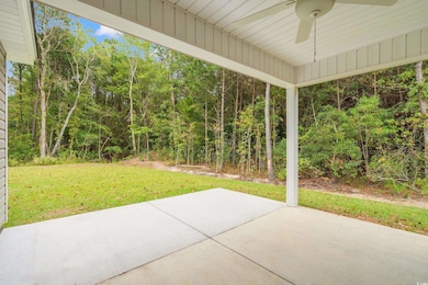 View of patio with a ceiling fan