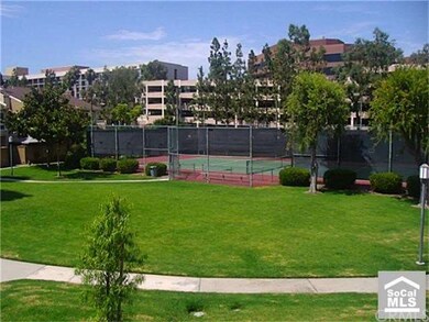 View of Tennis Court from Master Bedroom Patio