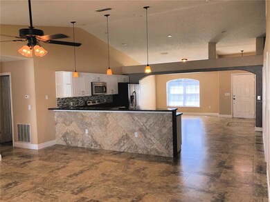 OPEN KITCHEN/DINING/LIVING AREA