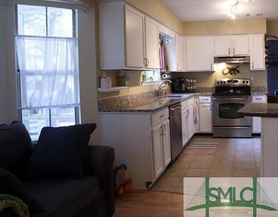 Kitchen. Family room opens to updated kitchen with