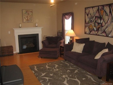 Gas logs in this beautiful family room with bamboo