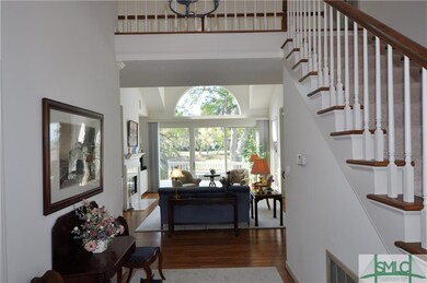 Foyer opens to the Living Room with gorgeous views