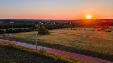 View of property's community featuring fence and a