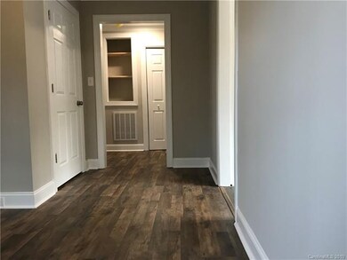 View from dining room off kitchen area into the ha