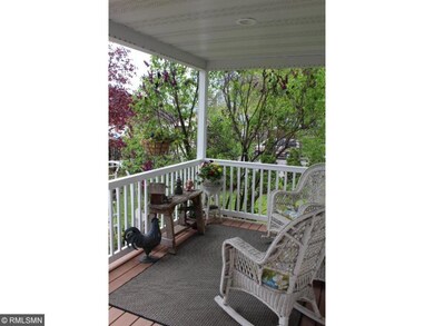 Maintenance free covered back porch boasts views o