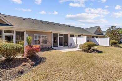 Back of house with a patio area, fence, a lawn, an