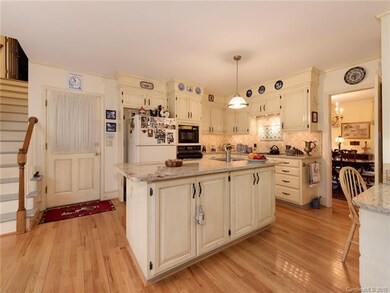Large Serving Island Opens to both the Breakfast A
