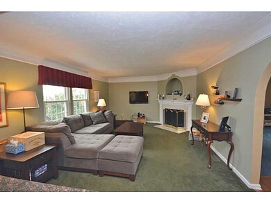 Family Room. Crown molding and gas fireplace in fa