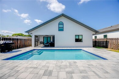 View of swimming pool featuring a patio area and c