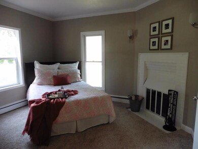 master bedroom with fireplace