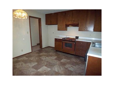 Kitchen. With fresh paint and new vinyl, this spac