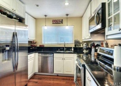 A suite of stainless steel appliances and counter 