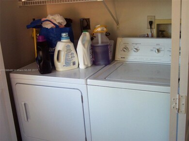 FULL-SIZED WASHER AND DRYER IN KITCHEN