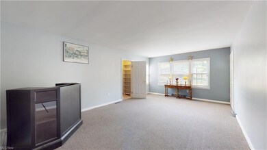 Living room view from dining room, toward front do
