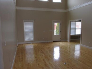 Come on in to the great room.  Notice the high ceilings.  Windows on two levels let in all the natural light you need.