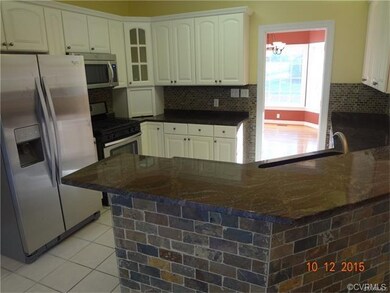 Renovated kitchen with new appliances and granite 