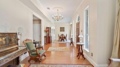 View of Formal Dining Room and beautiful Chandelie
