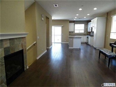 Second floor: spacious room with a fireplace