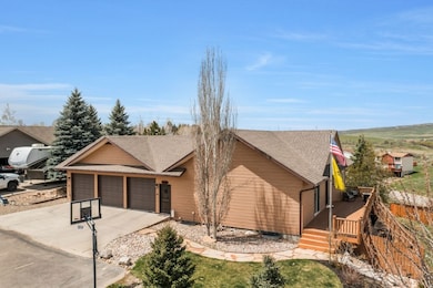 View of front facade featuring roof with shingles,
