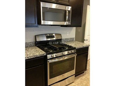 Property Photo. GE stainless microwave and stove