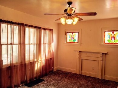 Living room with two beautiful Stain Glass Windows