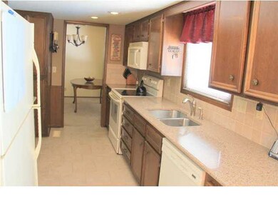 Kitchen - Quartz counters & tile floor
