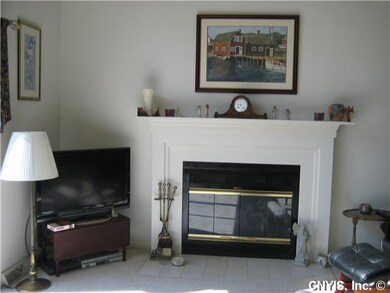 Living Room. Gas fireplace with painted wood mantl