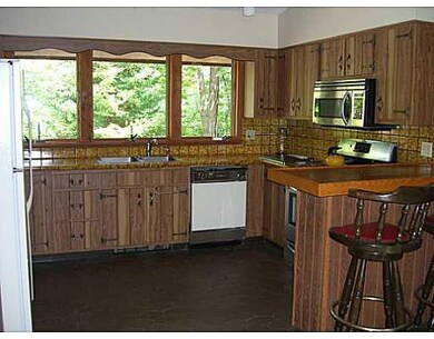 Kitchen. Gas stove with JenAir grill