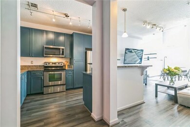 Kitchen with appliances with stainless steel finis