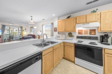 Kitchen featuring a wealth of natural light, stain