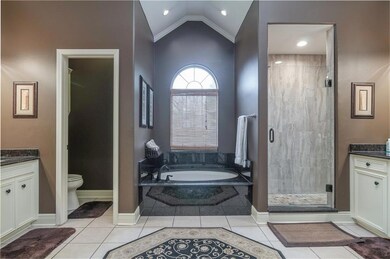 The large master bath features 2 separate sink van