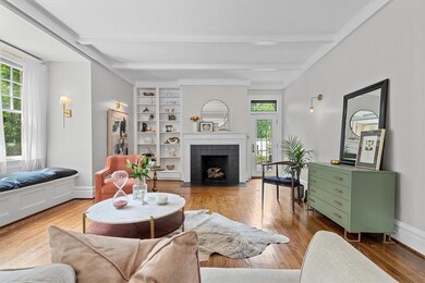 Built in bookshelves and a door that leads onto th