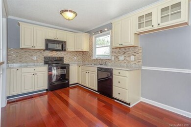New Tile Backsplash and Smooth Countertops