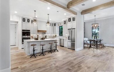 Photo is from a previous house the builder built t