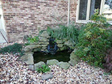 Exterior Front. fountain by entrance