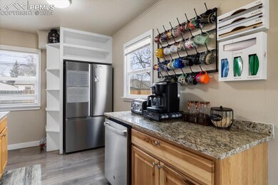 Kitchen featuring light wood-type flooring, light 