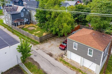Rear Exterior w/ Garage + Carriage House