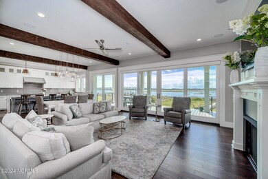 Open concept living room w/ fireplace