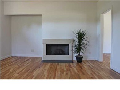 Wood burning fireplace with Kansas sandstone face.