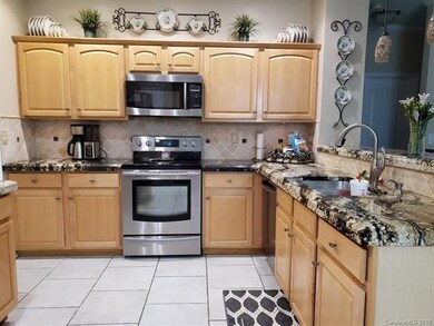 Gourmet kitchen with Samsung appliances (stove, mi