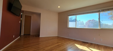 Unfurnished room featuring light wood finished floors and recessed lighting
