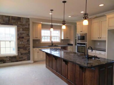 Beautiful Kitchen with Custom Cabinets and Granite Counter Tops